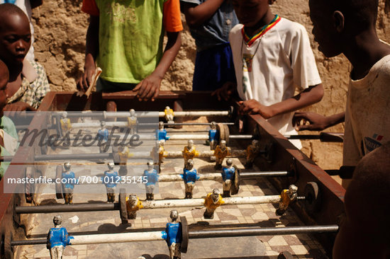 Children Playing Football In Africa